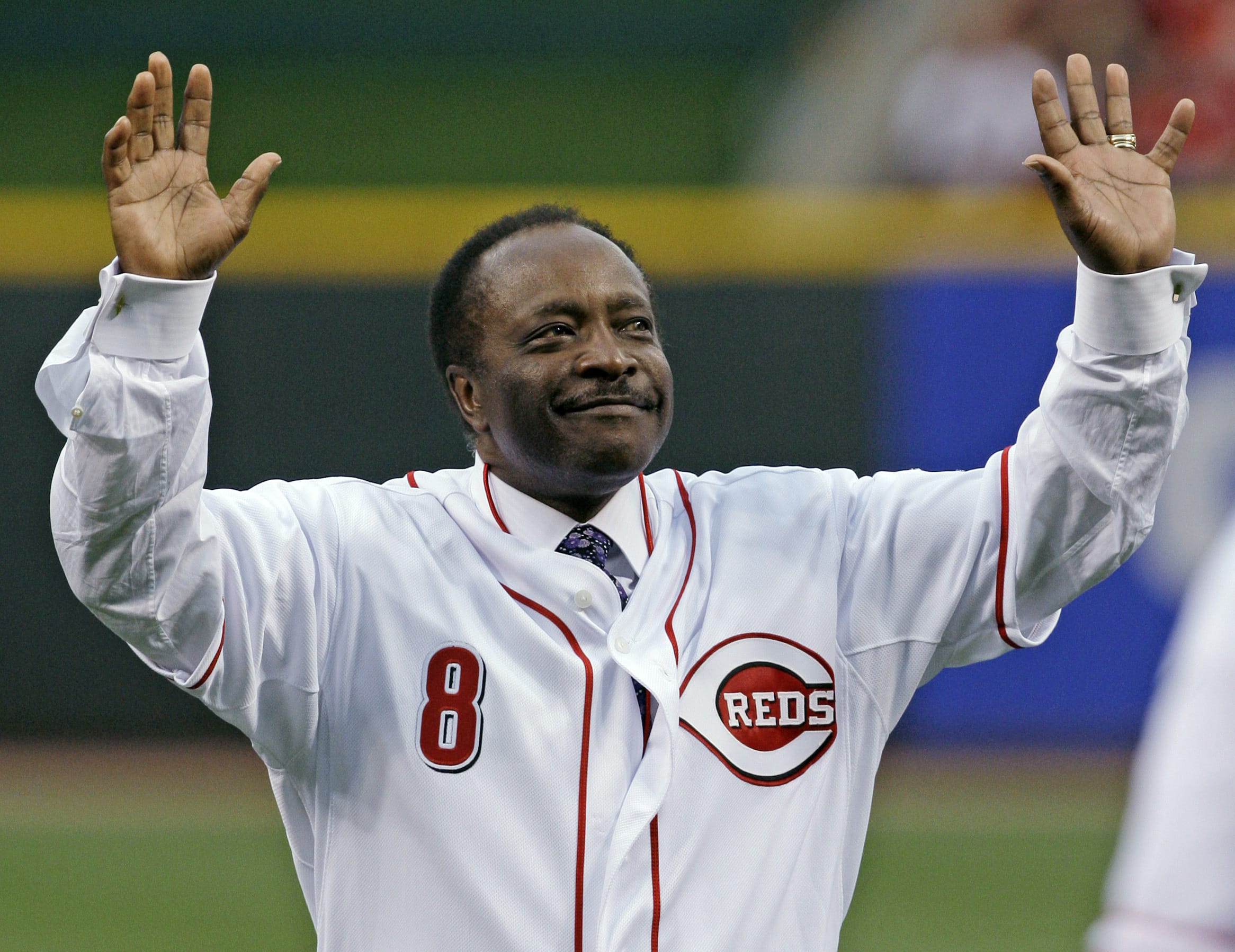 Cincinnati Reds Hall of Fame second baseman Joe Morgan acknowledges the crowd after throwing out a ceremonial first pitch in 2010. A family spokesman says Morgan died at his home Sunday, Oct. 11, 2020, in Danville, Calif. He was 77.