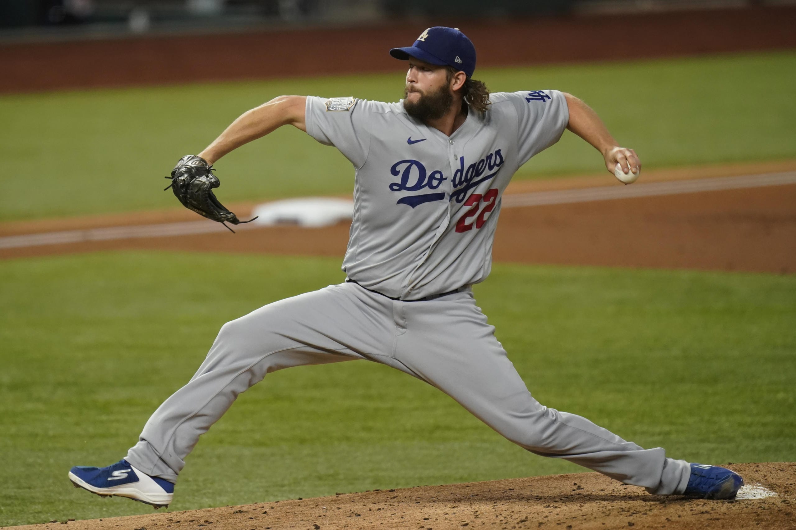 Los Angeles Dodgers starting pitcher Clayton Kershaw throws against the Tampa Bay Rays during the first inning in Game 5 of the baseball World Series Sunday, Oct. 25, 2020, in Arlington, Texas.