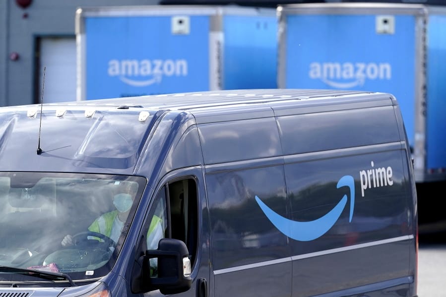 An Amazon Prime logo appears on the side of a delivery van as it departs an Amazon Warehouse location, Thursday, Oct. 1, 2020, in Dedham, Mass. Halloween is still weeks away, but retailers are hoping you&#039;Aoll start your holiday shopping now. The big push is coming from Amazon, which is holding its annual Prime Day sales event Tuesday, Oct. 13 and Wednesday, Oct. 14.