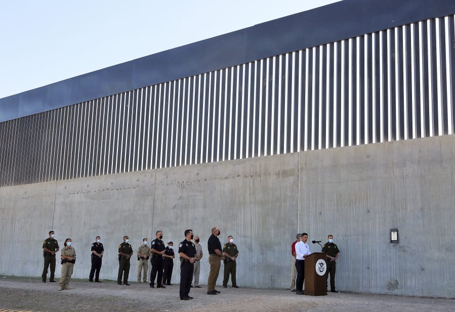 Acting Homeland Secretary Chad Wolf gives a speech in front of a new section of the border wall Thursday, Oct. 29, 2020, in McAllen, Texas.