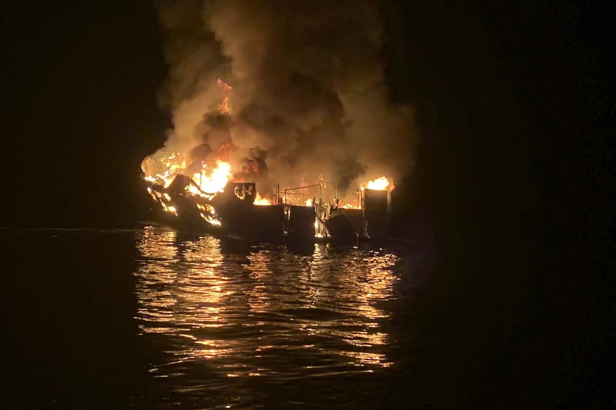 FILE - In this Sept. 2, 2019, file photo provided by the Santa Barbara County Fire Department, the dive boat Conception is engulfed in flames after a deadly fire broke out aboard the commercial scuba diving vessel off the Southern California Coast. Federal authorities are expected to vote Tuesday, Oct. 20, 2020 on what likely sparked a fire aboard a scuba dive boat last year that killed 34 people off the coast of Southern California. The pre-dawn blaze aboard the Conception is one of California&#039;s deadliest maritime disasters, prompting both criminal and safety investigations into the Sept. 2, 2019 tragedy that claimed the lives of 33 passengers and one crew member on a Labor Day weekend expedition near an island off Santa Barbara.
