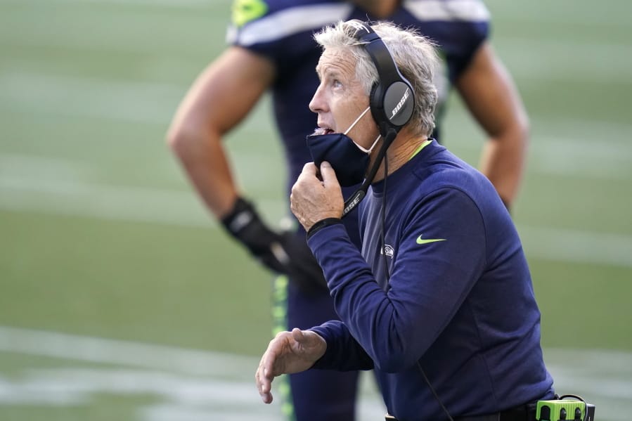 Seattle Seahawks head coach Pete Carroll reacts on the sidelines during the second half of an NFL football game against the Dallas Cowboys, Sunday, Sept. 27, 2020, in Seattle.