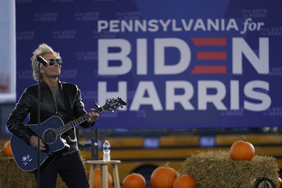 Musician Jon Bon Jovi performs at a campaign event for Democratic presidential candidate former Vice President Joe Biden at Dallas High School in Dallas, Pa., Saturday, Oct. 24, 2020.