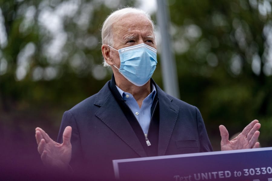 Democratic presidential candidate former Vice President Joe Biden speaks to members of the media outside a voter service center, Monday, Oct. 26, 2020, in Chester, Pa.