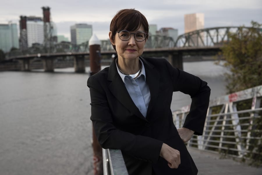 Portland, Oregon, mayoral candidate Sarah Iannarone poses in Portland, Friday, Oct. 9, 2020. With Election Day weeks away, Portland Mayor Ted Wheeler is trailing in the polls behind Iannarone.