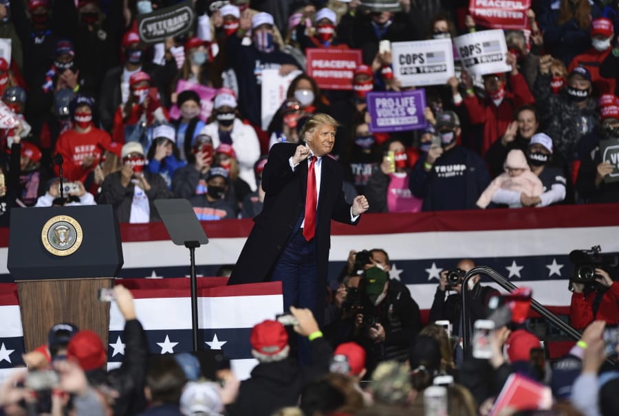 President Donald Trump dances to music during a campaign rally at the John Murtha Johnstown-Cambria County Airport in Johnstown, Pa., Tuesday, Oct. 13, 2020.
