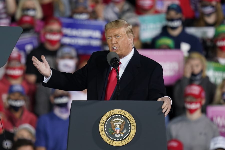 President Donald Trump speaks at a campaign rally at Des Moines International Airport, Wednesday, Oct. 14, 2020, in Des Moines, Iowa.