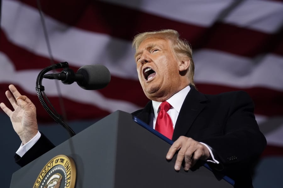 President Donald Trump speaks at a campaign rally at Des Moines International Airport, Wednesday, Oct. 14, 2020, in Des Moines, Iowa.