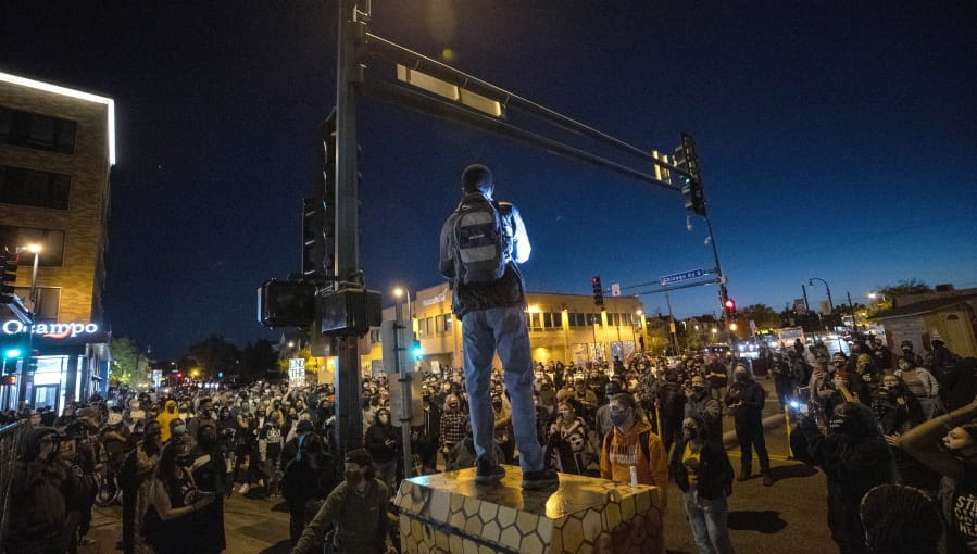 Protesters block an intersection in Minneapolis on Wednesday, Oct. 7, 2020, after Derek Chauvin, the former Minneapolis police officer charged with murder in the death of George Floyd, posted bail and was released from prison.
