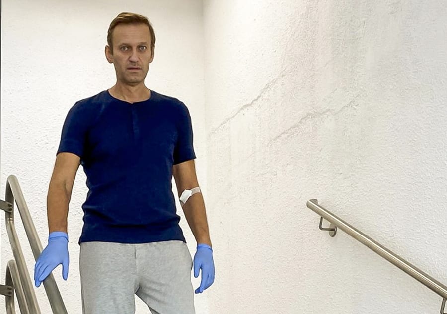 In this photo taken from a video published by Russian opposition leader Alexei Navalny on his instagram account, Russian opposition leader Alexei Navalny walks down stairs in a hospital in Berlin, Germany, Saturday, Sept. 19, 2020. The German hospital treating Russian opposition leader Alexei Navalny for poisoning says his condition improved enough for him to be released from the facility. The Charite hospital in Berlin said Wednesday Sept.
