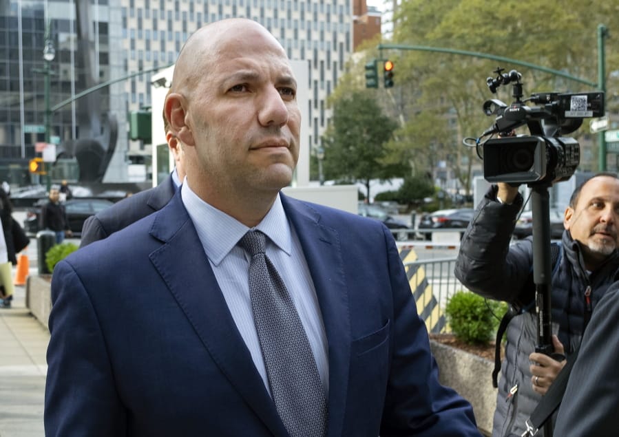FILE- In this Oct. 17, 2019 file photo, David Correia walks from federal court in New York. A change-of-plea hearing is set for Thursday, Oct. 29, 20210, for Correia, who is charged with conspiring with associates of Rudy Giuliani, one of President Donald Trump&#039;s lawyers, to make illegal campaign contributions.