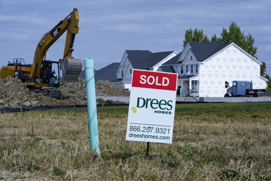 A &quot;sold&quot; sign sits on a lot as new home construction continues in Westfield, Ind., Friday, Sept. 25, 2020. U.S. home construction rose a solid 1.9% in September after having fallen in August as home building remains one of the bright spots for the economy.