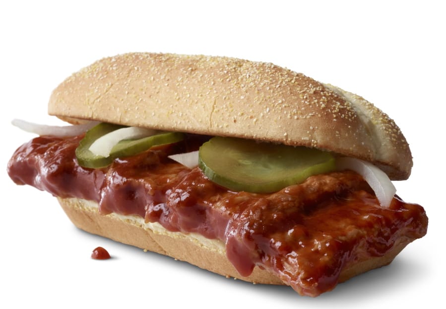 This photo provided by McDonald&#039;s shows the McRib sandwich.  McDonald&#039;s announced that it was bringing its barbeque slathered sandwich with the cult following back for yet another run on Dec. 2. The fast-food giant said the sandwich would be available nationally for the first time since 2012, but only at participating restaurants for a limited time.