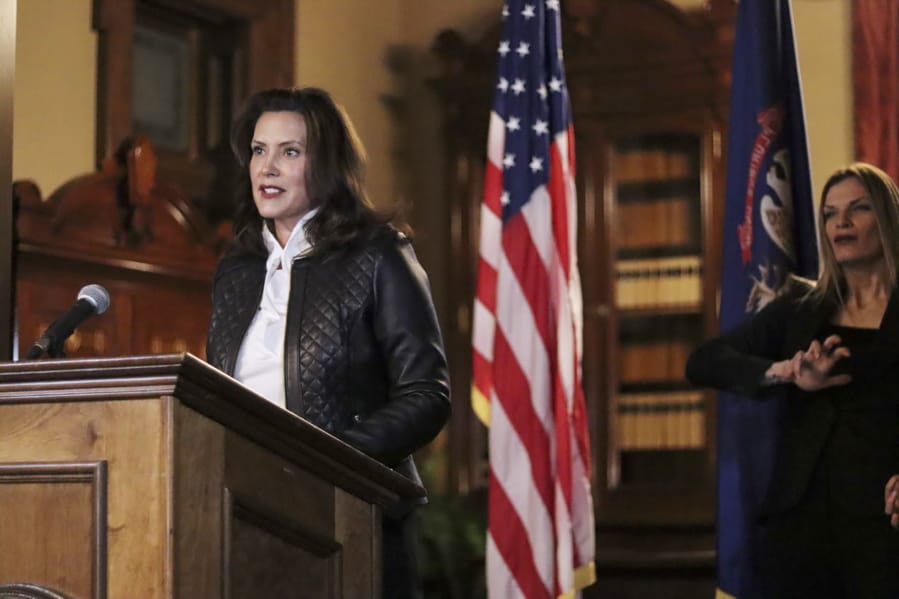 In a photo provided by the Michigan Office of the Governor, Michigan Gov. Gretchen Whitmer addresses the state during a speech in Lansing, Mich., Thursday, Oct. 8, 2020. The governor delivered remarks addressing Michiganders after the Michigan Attorney General, Michigan State Police, U.S. Department of Justice, and FBI announced state and federal charges against 13 members of two militia groups who were preparing to kidnap and possibly kill the governor.