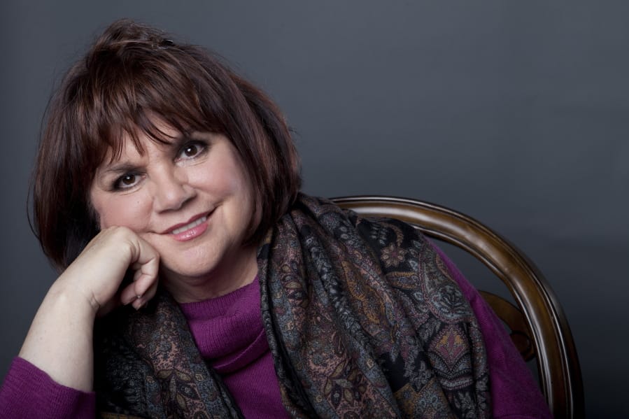 FILE - In this Sept. 17, 2013 file photo, American musician Linda Ronstadt poses in New York to promote the release of her memoir &quot;Simple Dreams.&quot; Now at 74, the 10-time Grammy winner and Rock and Roll Hall of Famer has been recognized as a &quot;Legend&quot; at the 33rd annual Hispanic Heritage Awards.