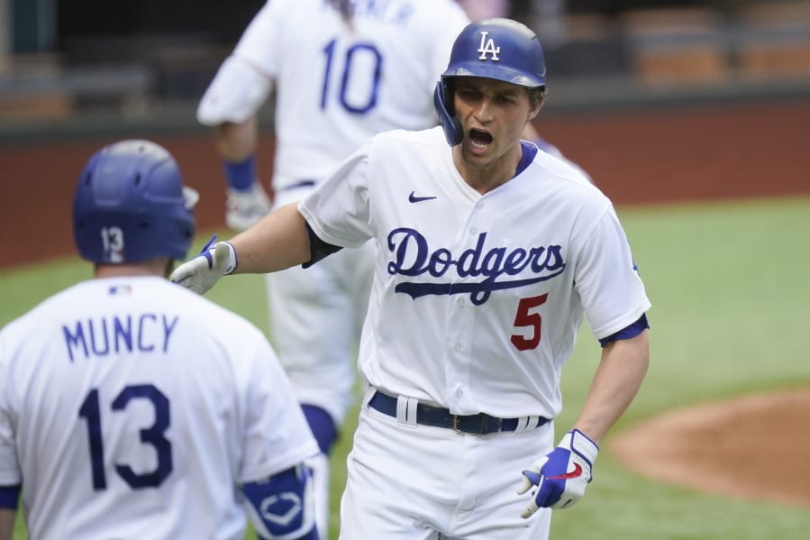 Los Angeles Dodgers&#039; Corey Seager celebrates his home run against the Atlanta Braves during the first inning in Game 6 of a baseball National League Championship Series Saturday, Oct. 17, 2020, in Arlington, Texas.