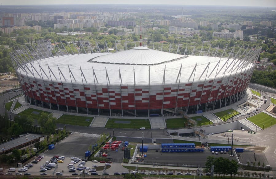 FILE - This Friday, May 18, 2012 file photo aerial view, made from an hot air balloon, shows the National Stadium, in Warsaw, Poland. Poland&#039;s government is transforming the National Stadium in Warsaw into a field hospital to handle the surging number of patients infecting with the coronavirus. A government spokesman said Monday, Oct. 19, 2020 that the stadium will have room for 500 patients and will be equipped with oxygen therapy for those who need it.