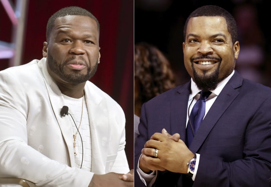 Curtis &quot;50 Cent&quot; Jackson participates in the Starz &quot;Power&quot; panel at the Television Critics Association Summer Press Tour in Beverly Hills, Calif., on July 26, 2019, left, and BIG3 League founder Ice Cube at the debut of the BIG3 Basketball League in New York on June 25, 2017. An altered photo of the rappers in hats that appear to show support for President Donald Trump circulated widely on social media Tuesday, fueled in part by a tweet by Eric Trump. The manipulated image was shared thousands of times on Twitter and Facebook since it began gaining attention on Monday.