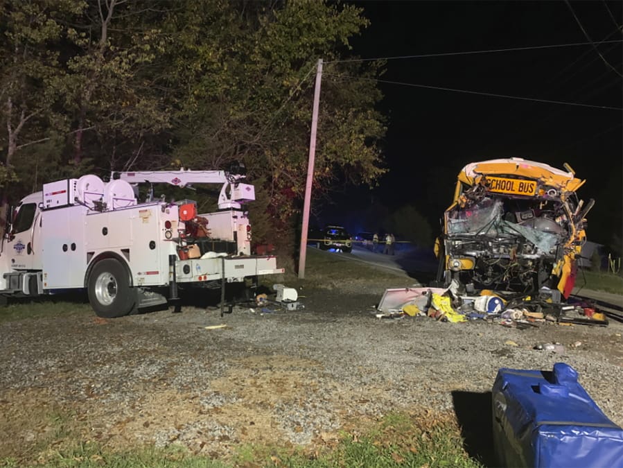 This photo provided by the Tennessee Highway Patrol shows the scene of deadly crash involving a utility vehicle and a school bus carrying children on Tuesday evening, Oct. 27, 2020, in Decatur, Tenn.