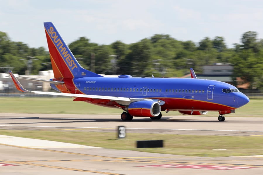 FILE - A Southwest Airlines jet takes off from Love Field in Dallas, Wednesday, June 24, 2020. Southwest Airlines says its workers must take pay cuts or face furloughs next year. CEO Gary Kelly said Monday, Oct. 5, 2020 that Southwest needs to cut spending sharply or risk losing billions of dollars every three months.