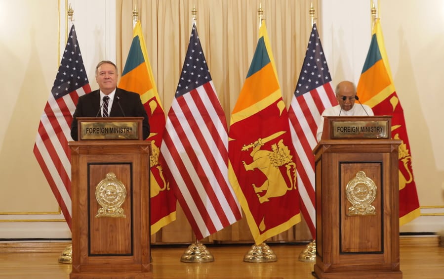 U.S. Secretary of State Mike Pompeo and Sri Lankan Foreign Minister Dinesh Gunawardena attend a joint press briefing in Colombo, Sri Lanka, Wednesday, Oct. 28, 2020. Pompeo plans to press Sri Lanka to push back against Chinese assertiveness, which U.S. officials complain is highlighted by predatory lending and development projects that benefit China more than the presumed recipients. The Chinese Embassy in Sri Lanka denounced Pompeo&#039;s visit to the island even before he arrived there, denouncing a senior U.S. official&#039;s warning that the country should be wary of Chinese investment.