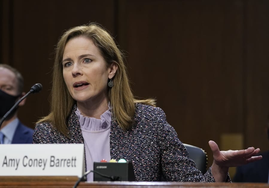 Supreme Court nominee Amy Coney Barrett testifies before the Senate Judiciary Committee during the third day of her confirmation hearings on Capitol Hill in Washington, Wednesday, Oct. 14, 2020.