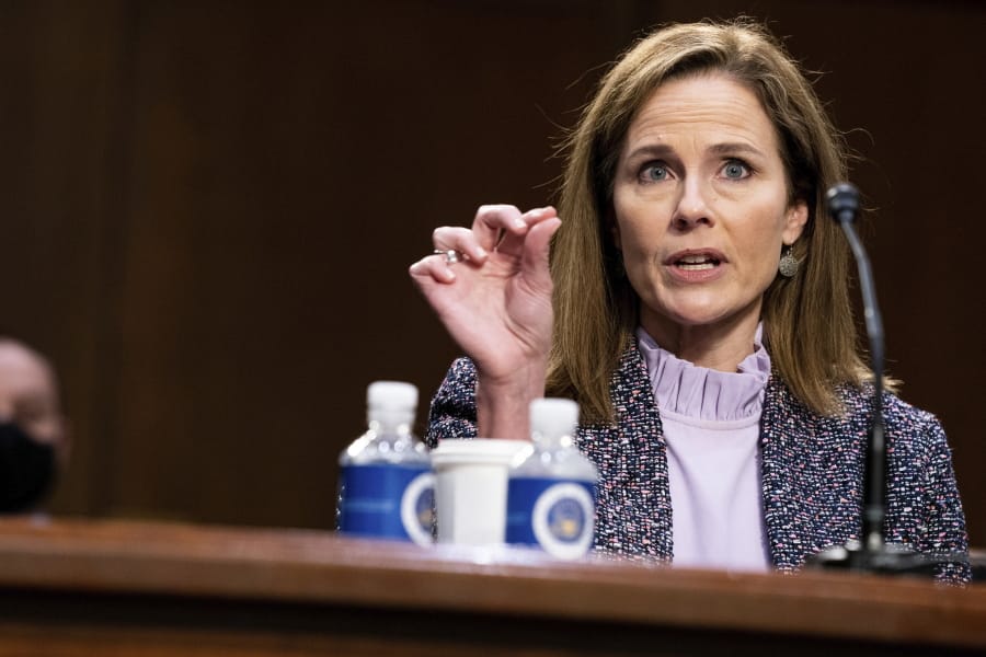 Supreme Court nominee Amy Coney Barrett speaks during a confirmation hearing before the Senate Judiciary Committee, Wednesday, Oct. 14, 2020, on Capitol Hill in Washington.