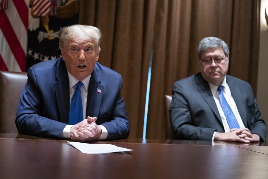 FILE - In this Sept. 23, 2020, file photo Attorney General William Barr listens as President Donald Trump speaks during a meeting with Republican state attorneys general in the Cabinet Room of the White House in Washington. The relationship between President Donald Trump and top ally Attorney General William Barr is fraying over the lack of splashy indictments so far in the Justice Department&#039;s investigation into the origins of the Russia probe, according to people familiar with the matter.