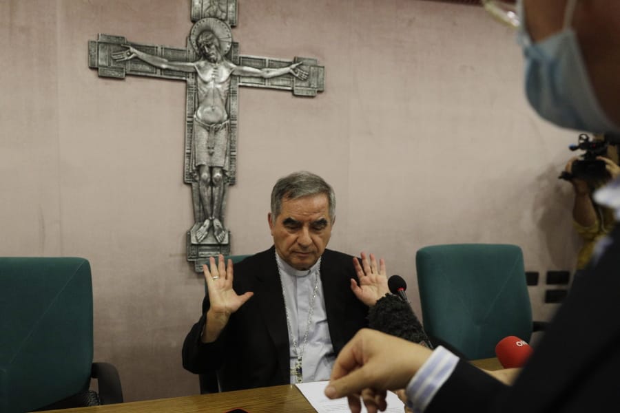 FILE - In this Sept. 25, 2020 Cardinal Angelo Becciu talks to journalists during a press conference in Rome. Italy&#039;s financial police said Wednesday, Oct. 14, 2020 that a Sardinian woman, Cecilia Marogna, said to be close to one of the Holy See&#039;s most powerful cardinals, Becciu, before his downfall, was arrested in Milan, northern Italy, late Tuesday on an international warrant issued by the Vatican City State.