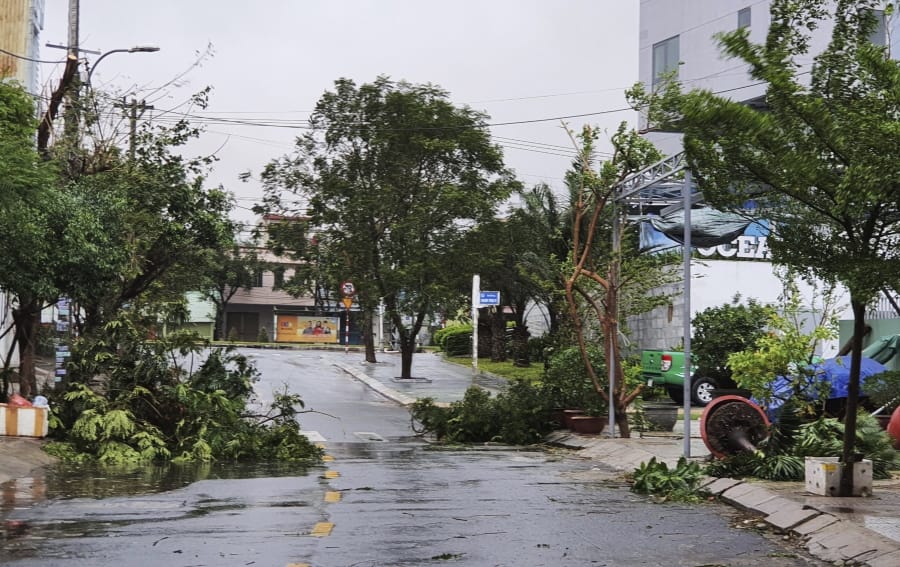 Broken tree branches caused by strong winds from typhoon Molave lie on a deserted street in Da Nang, Vietnam Wednesday, Oct. 28, 2020. Typhoon Malove sank a few fishing boats as it approached Vietnam&#039;s south central coast on Wednesday morning.