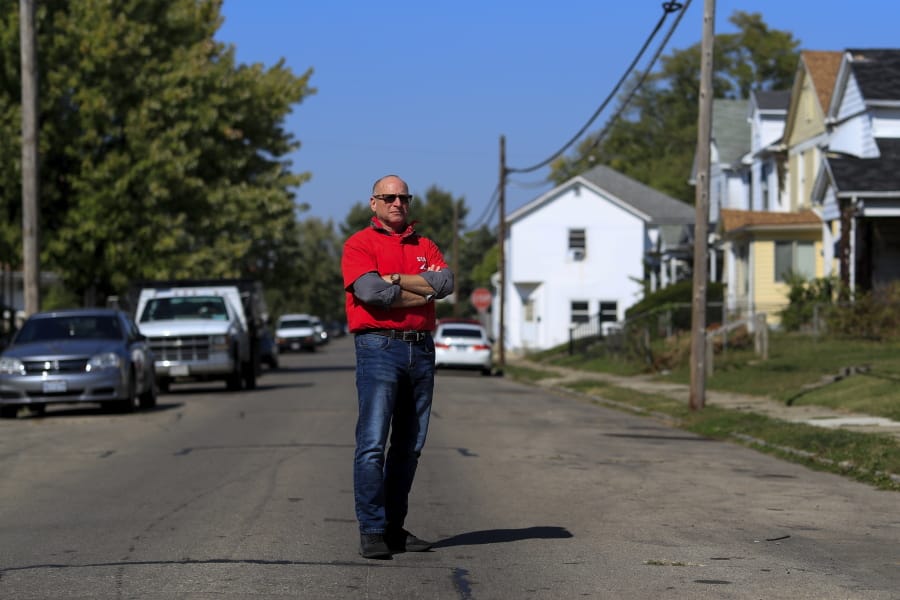 Gary Zaremba stands for a portrait outside of a house he oversees, Wednesday, Oct. 7, 2020, in Dayton, Ohio. Seven months after the pandemic began, landlords face an even more uncertain future. Zaremba, who owns and and manages 350 apartment units spread out over 100 buildings in Dayton, Ohio, said he has been working with struggling tenants and directs them to social service agencies for additional help.