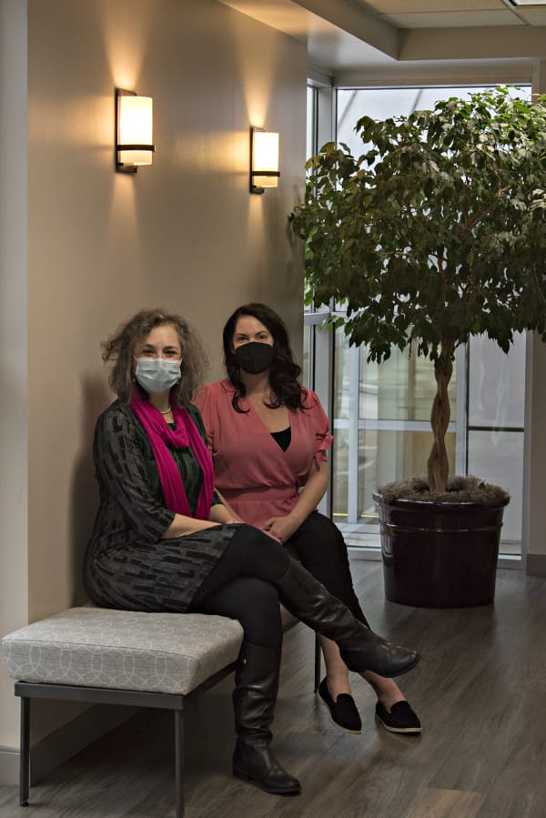 Susan Stearns, left, CEO of the Pink Lemonade Project, pauses for a portrait with Melissa Mohr, practice manager at Dr. Allen Gabriel&#039;s office in Vancouver. Stearns and Mohr have worked together on Holiday Glow, which will provide financial assistance to breast cancer patients and those in recovery this holiday season.