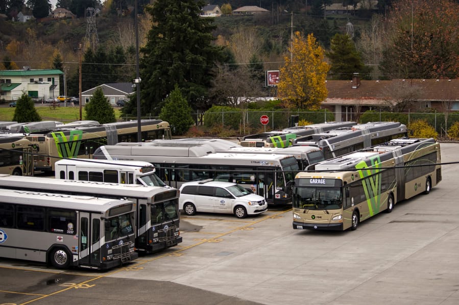 A 60-foot Vine bus drives through the lot at the C-Tran bus yard in Vancouver. C-Tran&#039;s first bus rapid transit line debuted on Fourth Plain Boulevard in 2017, and construction is slated to start next year on a second line along Mill Plain Boulevard.
