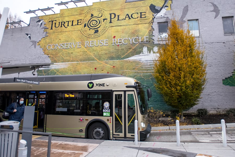 One of C-Tran&#039;s 60-foot Vine buses makes a stop at the Turtle Place stop on Tuesday in downtown Vancouver.