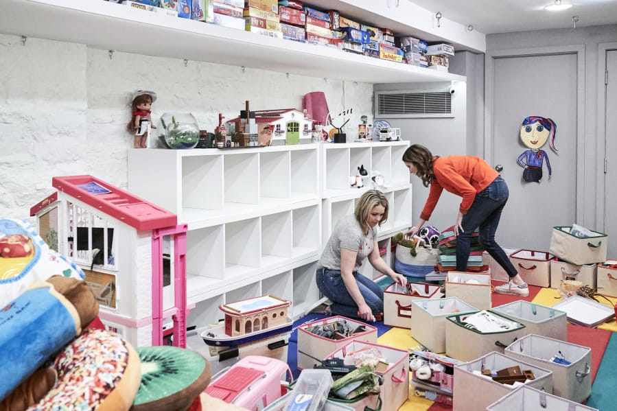 Clea Shearer, right, and Joanna Teplin tackle and unruly play room in &quot;Getting Organized with the Home Edit&quot; on Netflix.