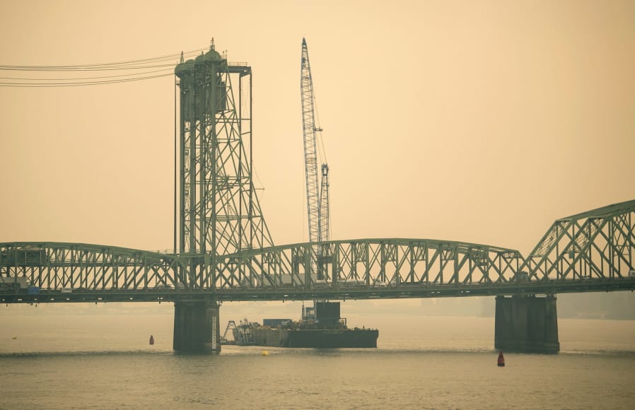 The lift towers on the northbound span of the Interstate 5 Bridge in Vancouver are shrouded by smoky air from wildfires on Sept. 1.