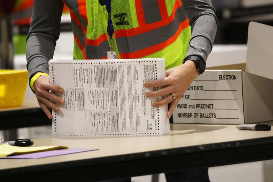 Election workers count ballots on November 04, 2020 in Philadelphia, Pennsylvania.