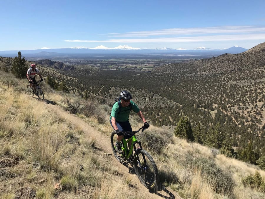 Two mountain bikers ride the Gray Butte Trail near Smith Rock State Park.