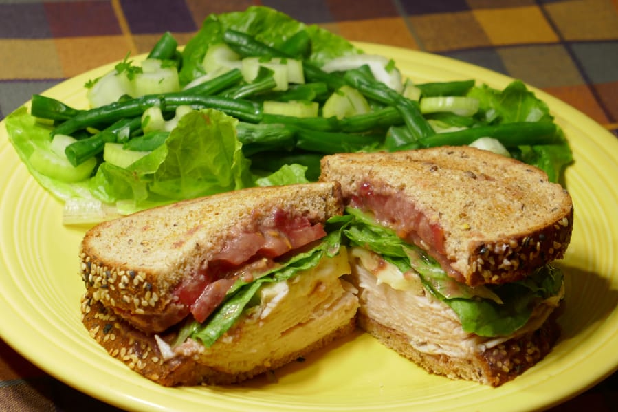 Toasted Turkey and Cranberry Sandwich with Green Bean Salad.