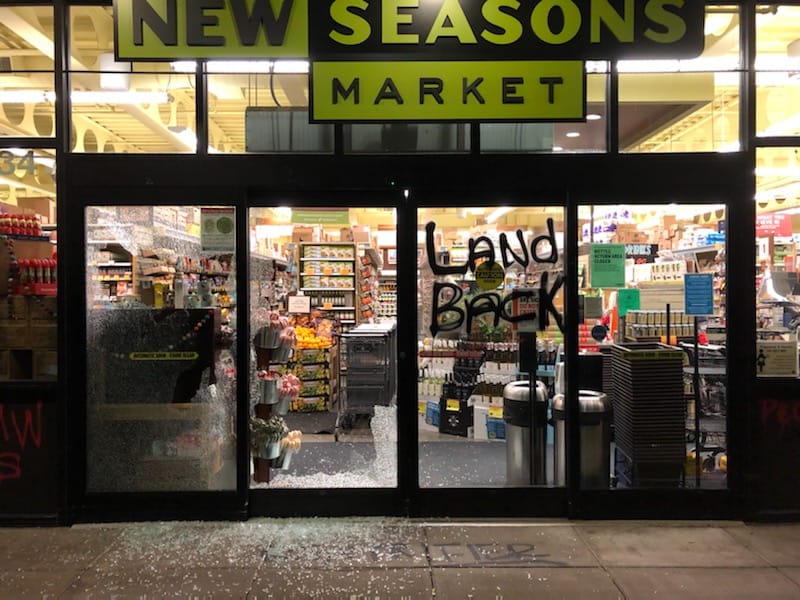Portland Police responded to reports of people breaking windows and spraying graffiti on the New Seasons Market in the 4000 block of Southeast Hawthorne Boulevard early Thursday morning.