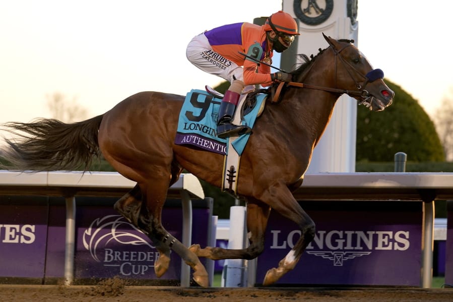 John Velazquez (9) rides Authentic to win the Breeder&#039;s Cup Classic horse race at Keeneland Race Course, in Lexington, Ky., Saturday, Nov. 7, 2020.