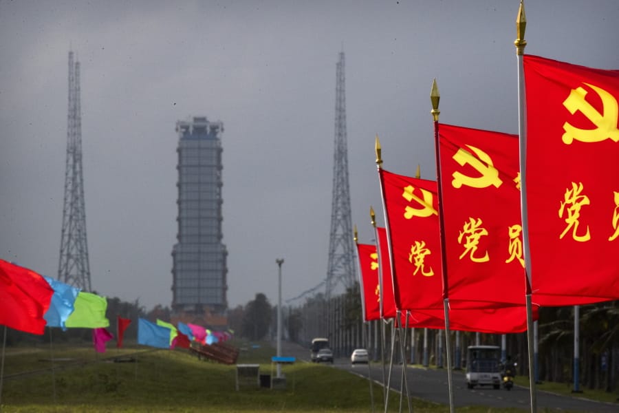 Flags with the logo of the Communist Party of China fly in the breeze near a launch pad at the Wenchang Space Launch Site in Wenchang in southern China&#039;s Hainan province, Monday, Nov. 23, 2020. Chinese technicians were making final preparations Monday for a mission to bring back material from the moon&#039;s surface for the first time in nearly half a century -- an undertaking that could boost human understanding of the moon and of the solar system more generally.