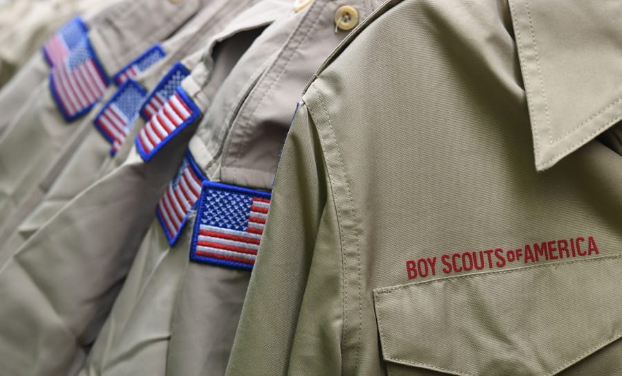 FILE - In this Feb. 18, 2020, file photo, Boy Scouts of America uniforms are displayed in the retail store at the headquarters for the French Creek Council of the Boy Scouts of America in Summit Township, Pa. Close to 90,000 sex-abuse claims have been filed against the Boy Scouts of America as the deadline arrived Monday, Nov. 16 for filing claims in the BSA&#039;s bankruptcy case. The number far exceeded initial projections of lawyers across the United States who have been signing up clients in the case since the Boy Scouts filed for bankruptcy protection in February in the face of hundreds of lawsuits.