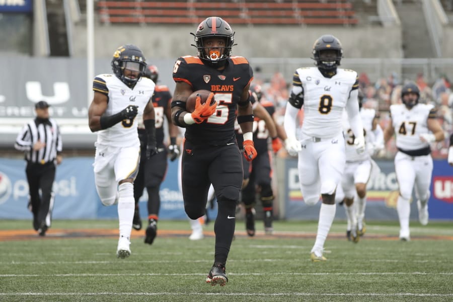 Oregon State running back Jermar Jefferson (6) runs 75-yards to score a touchdown on the first play of an NCAA college football game against California in Corvallis, Ore., Saturday, Nov. 21, 2020.