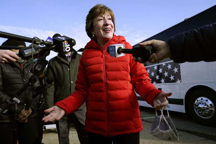 FILE - In this Nov. 4, 2020, file photo Republican Sen. Susan Collins, R-Maine, speaks to reporters in Bangor, Maine. (AP Photo/Robert F.