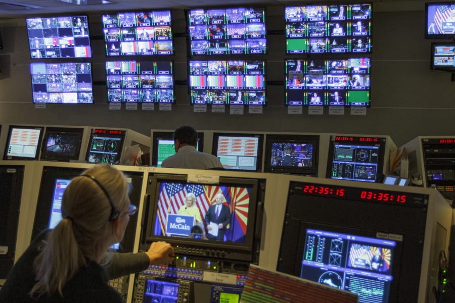 In this Nov. 8, 2016, photo, staff members of The Associated Press Television Network work in master control at the Washington bureau of The Associated Press in Washington, as returns come in during election night. The Associated Press says it plans to peel back the curtain and let people know how its experts declare winners and losers on election night. Given high interest in the presidential race, the complicating factor of strong early voting and President Donald Trump&#039;s warnings about potential fraud, television executives are making similar promises of transparency.