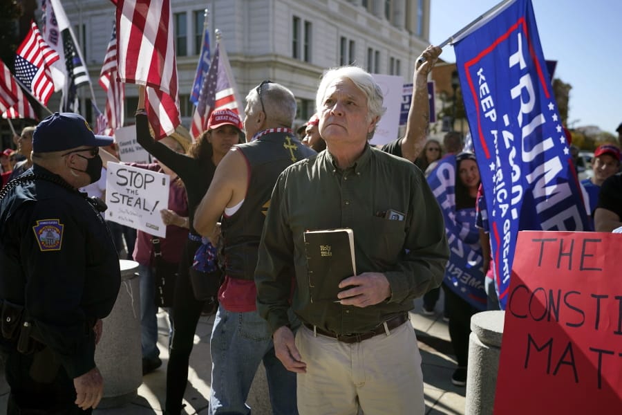 Supporters of President Donald Trump demonstrate outside the Pennsylvania State Capitol, Saturday, Nov. 7, 2020, in Harrisburg, Pa., after Democrat Joe Biden defeated President Donald Trump to become 46th president of the United States.