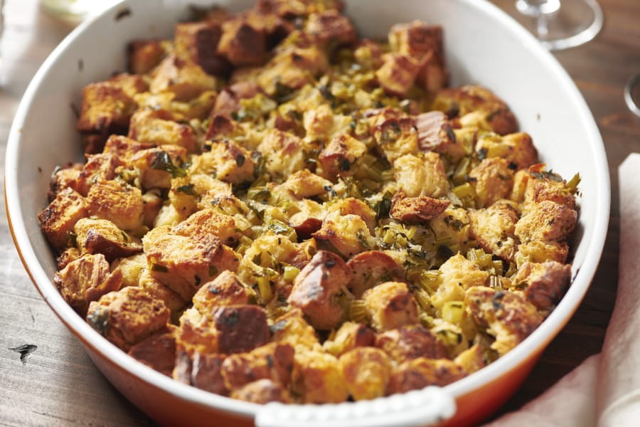 This August 2020 photo shows a recipe for traditional Thanksgiving stuffing in New York.  The recipe can be cut in half and baked in a smaller pan for less time for a smaller group.