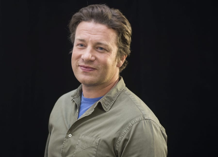 Jamie Oliver appears at the Gusto launch event at the TIFF Bell Lightbox in Toronto, Canada in 2016. Oliver&#039;s latest book, &quot;7 Ways: Easy Ideas for Every Day of the Week,&quot; came out on Tuesday.