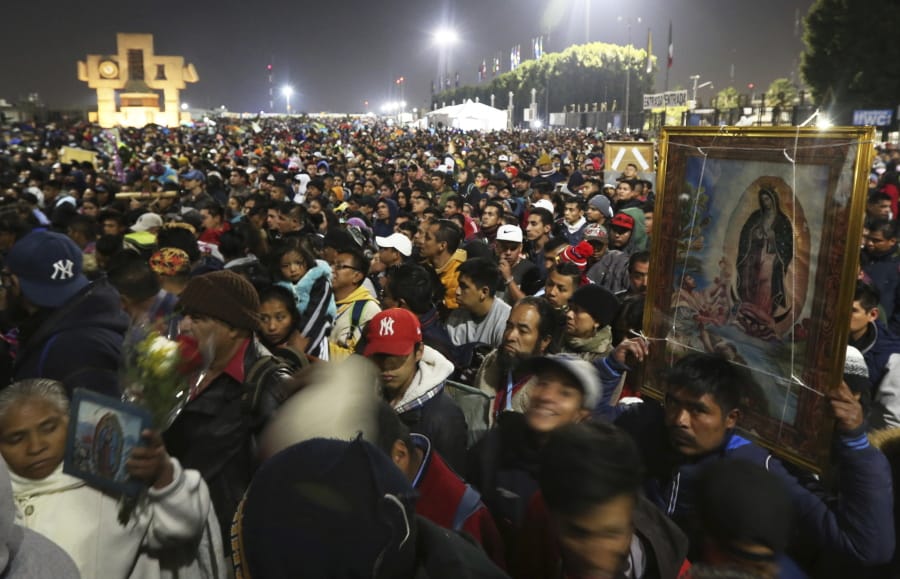 Pilgrims arrive Dec. 12 at the plaza outside the Basilica of Our Lady of Guadalupe in Mexico City. Due to the COVID-19 pandemic, the Mexican Catholic Church announced on Monday the cancellation of the annual pilgrimage, the largest Catholic pilgrimage worldwide.